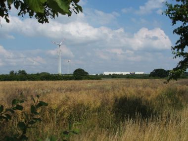 Wind farm near an IKEA store in Germany. Photo by Gerd W. Schmölter. Wikimedia Commons.