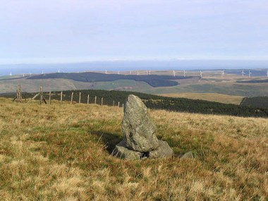 Haggis Hill in Ayrshire with wind farm in background. Photo by Walter Baxter. Wikimedia Commons. 