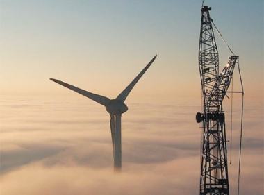 Wind turbine and crane.