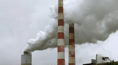 Emissions spew out of a large stack at the coal-fired Morgantown Generating Station in Newburg, Maryland. Scott Tong