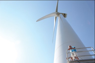 David Blittersdorf stands on one of the four wind turbines of the Georgia Mountain Community Wind project in northwest Vermont. Elodie Reed