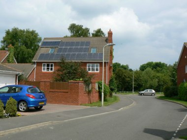 An Impressive Bank of Solar Panels St Marks Close, Bramley Green. Photo by Sebastian Ballard. CC BY-SA 2.0. Wikimedia Commons. 