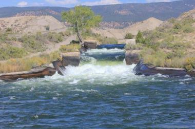 A power developer proposes to harness the power of tumbling water in a canal, to produce 990 kWh of electricity, or enough for 1,445 people. (Allen Best, Special to The Denver Post)