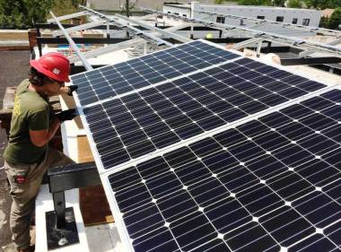 Char Colwell of Sundance Power Systems, installing a solar array in North Carolina. Photo courtesy of Sundance Power Systems 