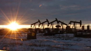 Even with the Paris Agreement on climate change, the oilpatch expects the sun will not set on it. (Matthew Brown/Associated Press)