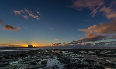 The sun sets at Hinkley Point nuclear power station. Photograph: iVistaphotography / Barcroft