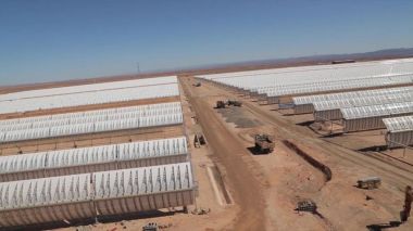 Rows of curved mirrors capture solar energy at the Ouarzazate plant in Morocco
