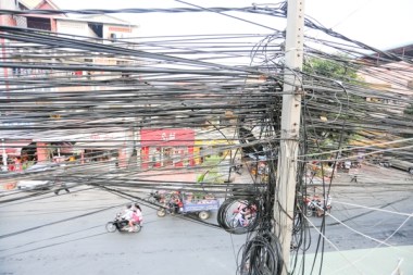 Tangled power cables are commonplace in Phnom Penh, like the ones above on Street 63. KT/ Mai Vireak