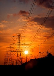 Sun and transmission lines. Photo by Dennis-Wilkinson via flickr. 