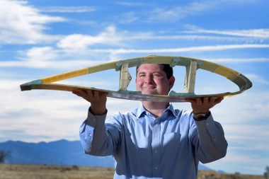 Todd Griffith shows a model of the cross-section of a 50-meter blade. (Photo by Randy Montoya)