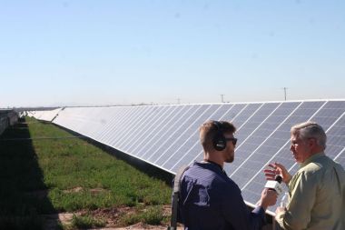 Jim Snyder, project manager for the new Sandstone Solar farm off, is interviewed after the dedication. Mark Cowling / Florence Reminder