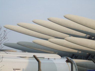 Wind turbine blades in storage. Photo by Glyn Drury. CC BY-SA 2.0. Wikimedia Commons.