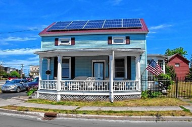 Rooftop solar panels are an increasingly large part of New England's power grid. Associated Press