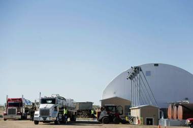 Trucks sit outside A1 Organic's facilities on Weld County Road 49. Eliott Foust | The Greeley Tribune