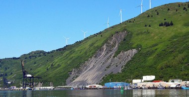 Matson Inc's massive electric crane and the Pillar Mountain wind farm. Photo by Margaret Kriz Hobson.