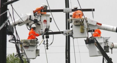 Entergy linemen at work. (Photo by Susan Poag, NOLA.com | The Times-Picayune archive)