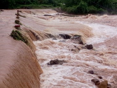 Flooded street after a heavy rain in the northern province of Quang Ninh. Photo: Pham Hai Sam / Thanh Nien