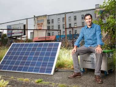 Mark Rabin, CEO of Portable Electric, shows off the 2-kWh VoltStack Mini, a two-kilowatt battery unit. [PNG Merlin Archive] Barry Calhoun / Vancouver Sun
