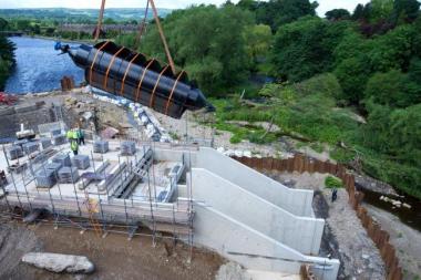 One of the two huge Archimedes screws being installed at Otley Weir.