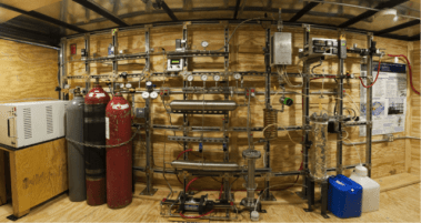 Interior of a mobile methanol synthesis trailer, hydrogen is produced and mixed with carbon dioxide for a fuel process. Photo courtesy of Steve Atkins.