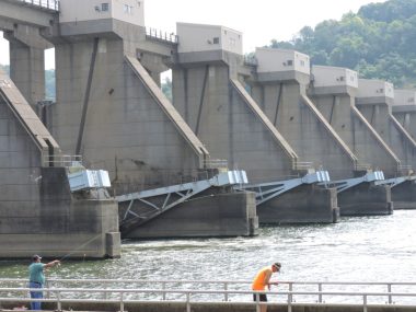 The Ohio side of the Pike Island Locks and Dam is a popular summer fishing spot. Photo by Casey Junkins.