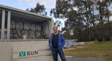 AVL managing director, Vincent Algar, next to the CellCube vanadium redox flow battery.